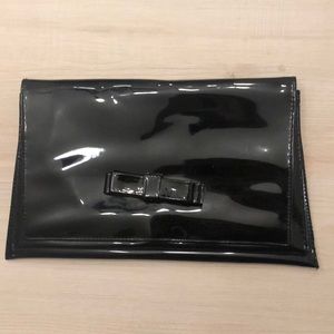 Shiny black clutch purse
